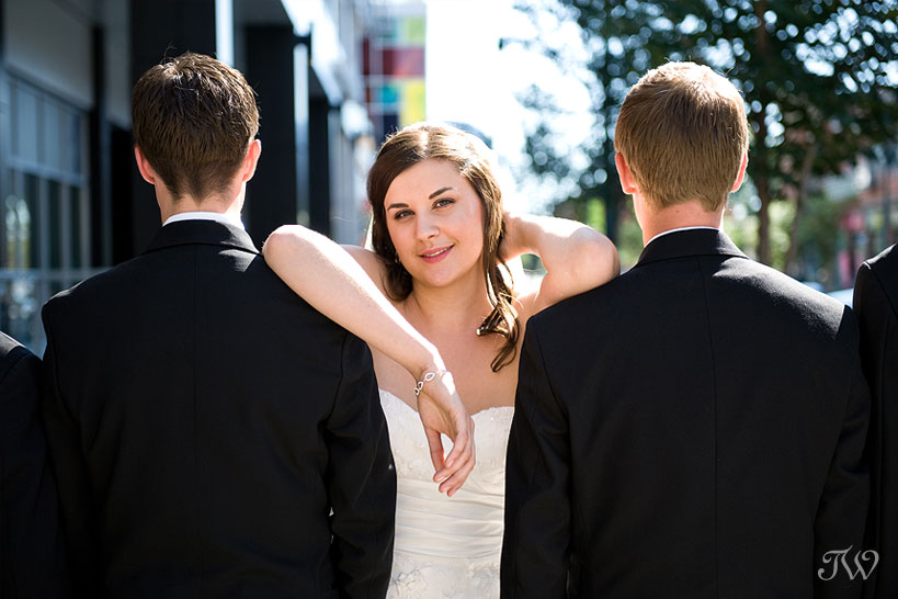 Calgary-wedding-photographer-at-hotel-arts-bride-and-groomsmen