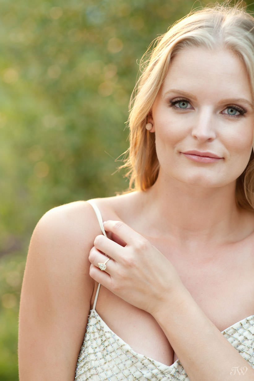 Bride and her engagement ring during Spray Lakes engagement session captured by Tara Whittaker Photography