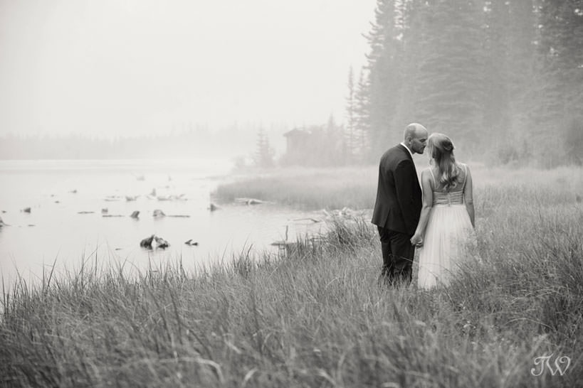 Kiss during a Spray Lakes engagement session captured by Tara Whittaker Photography