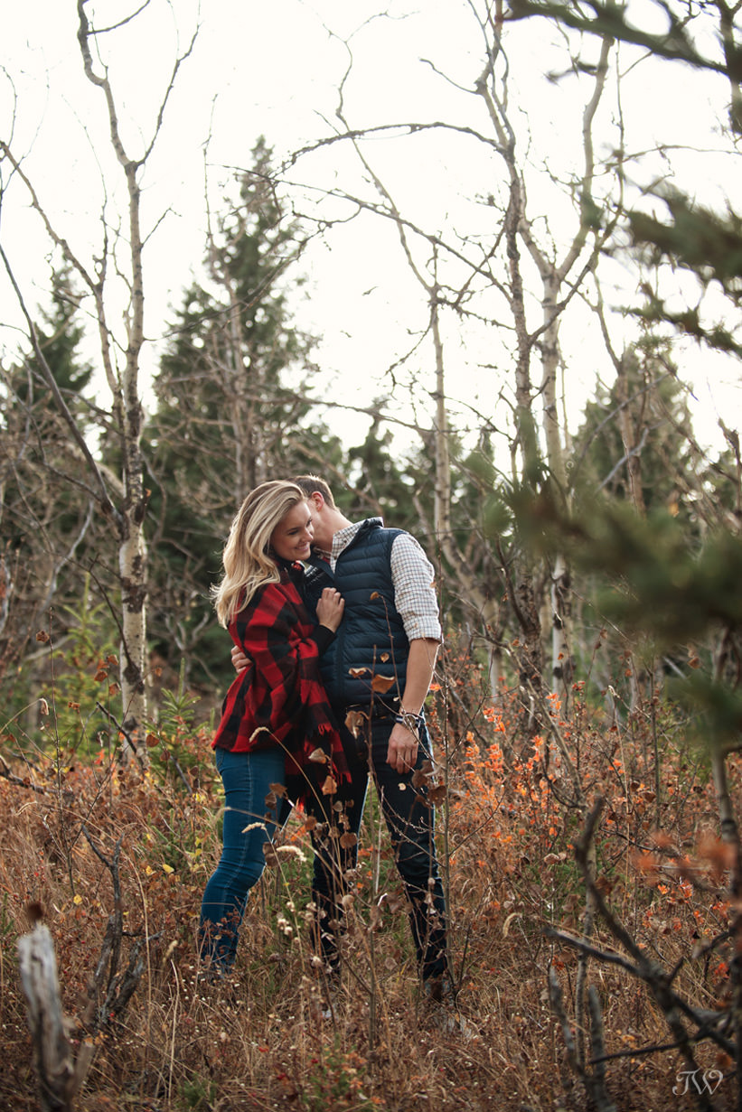 Sweet moment during Big Hill Springs engagement session captured by Tara Whittaker Photography